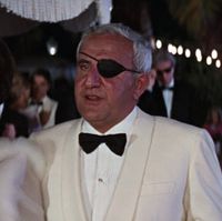 Emilio Largo in a White Dinner Jacket