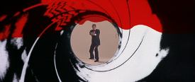 Roger Moore as James Bond in the Gun Barrel Sequence
