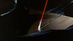 Laser Between Bond's Legs